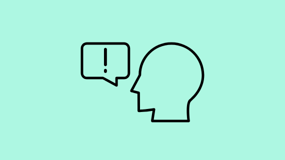A person with a speech bubble containing an exclamation point.