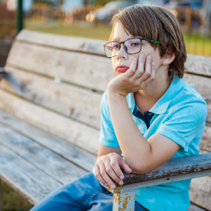 Child with sad facial expression