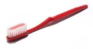 red tooth brush