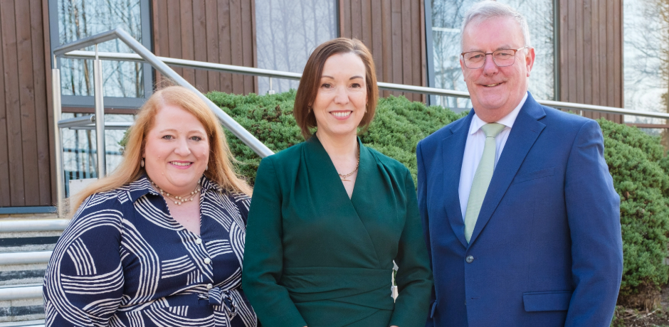 The Justice Minister, Naomi Long, the Chief Executive of the Northern Health and Social Care Trust, Jennifer Welsh, and the Health Minister, Mike Nesbitt, standing outside The Rowan.