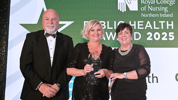 Christina Faulkner, winner of the Public Health Award, pictured with Colin Coffee and Rita Devlin.