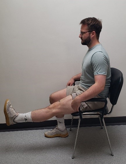 Person Demonstrating A Knee Extension Exercise 2