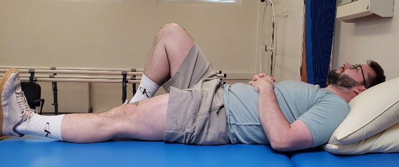 Person Demonstrating A Static Quads Exercise