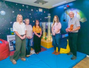 Pictured inside the new sensory room at Ellis Court are Deputy Manager Kylie Scates, Senior Support Worker Elaine Hall, Head of Service Angela Reid, Ellis Court Manager Laura Austin and Ivan Crowe from Carrickfergus and District Mencap Society.