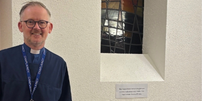 Hospital Chaplain, Rev Jonny Campbell-Smyth stands outside the hospital chapel.
