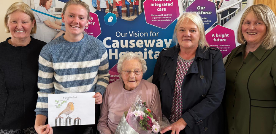 Ethel, winner of the Christmas card competition, with the Chair of the Northern Trust, Anne O'Reilly, and Interim Chief Executive Suzanne Pullins, along with her daughter and granddaughter.