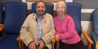Alan Morton sitting beside his wife Gail.