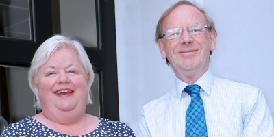 Man and woman standing beside each other to promote Carer Strategy.