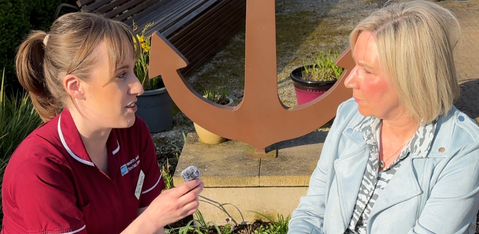 A nurse and a woman in conversation