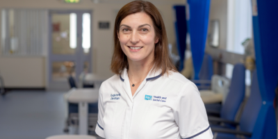 Dietitian standing in ward