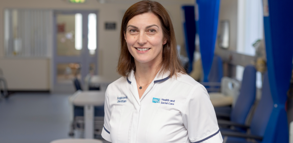 Dietitian standing in ward