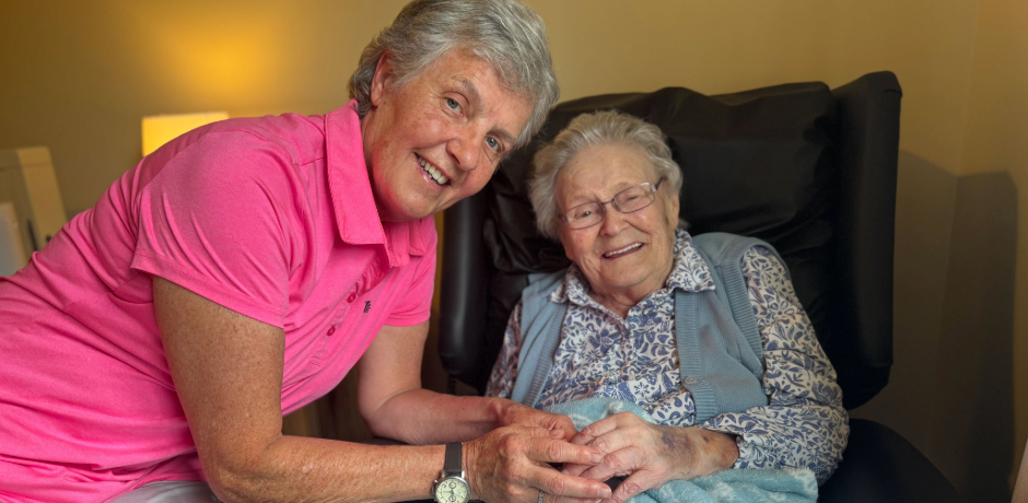 A woman and her elderly mother.