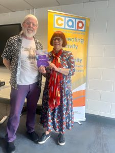Conor Shields, Chief Executive of Community Arts Partnership, stands beside Dr Shelley Tracey.