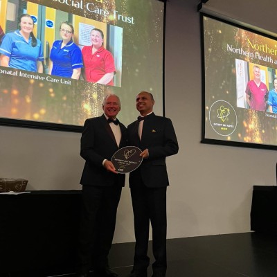 Consultant Paediatrician, Dr Sanjeev Bali, receives the award on stage during the ceremony. Consultant Paediatrician, Dr Sanjeev Bali receiving the award on stage during the ceremony.
