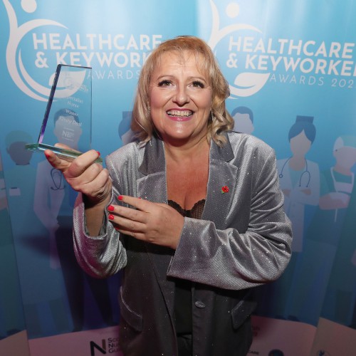 Midwife Kirsty Deal winner of the Specialist Nurse award for her work on the Continuity of Midwifery Carer team. Kirsty Deal holding her award.